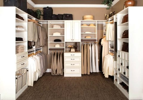 Large Master Closet With White Cabinets